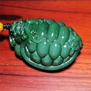 和田碧玉猫眼龙龟手把件